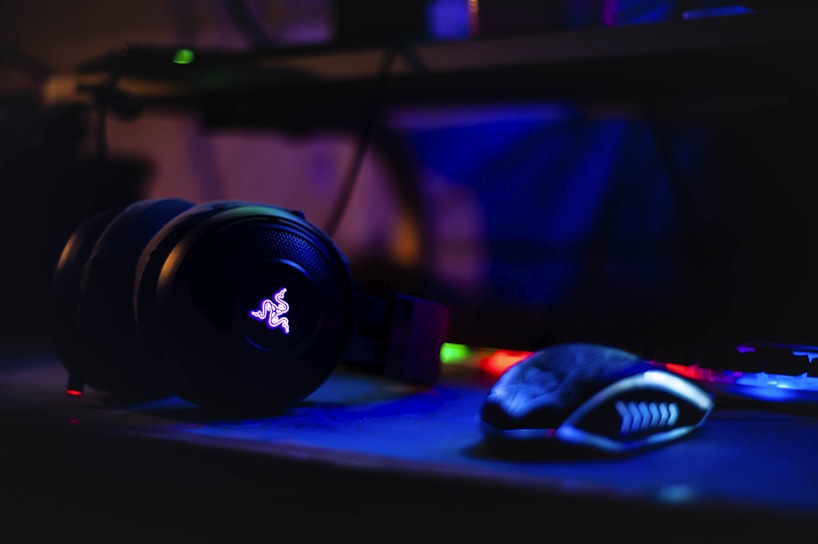 Razer headset near computer mouse