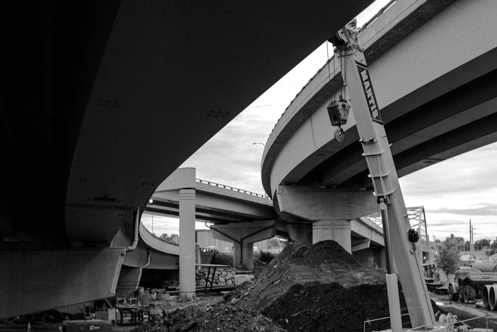 grayscale photography of concrete flyover roads