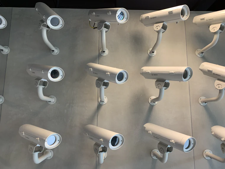 A row of bullet security cameras