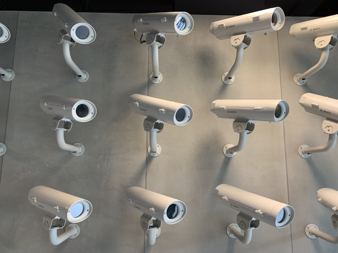 AI-Driven Camera Networks: Smarter Surveillance at Scale