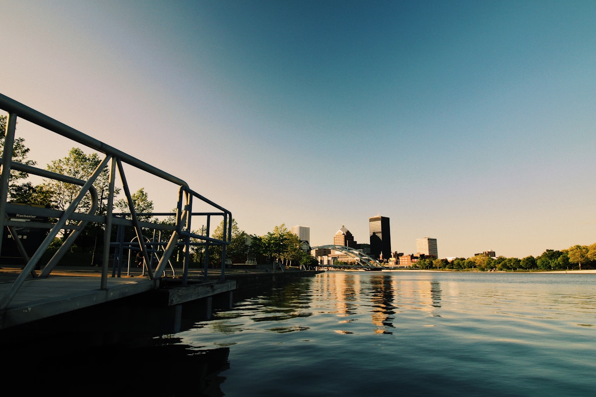 landscape photography of a wooden dock beside body of water