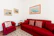 A cozy corner of a living room featuring mishfa’s stylish cushions and decor.