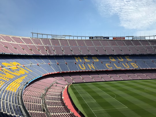 soccer specific stadium with no people under blue and white sky during daytime in Museo del Fútbol Club Barcelona Spain