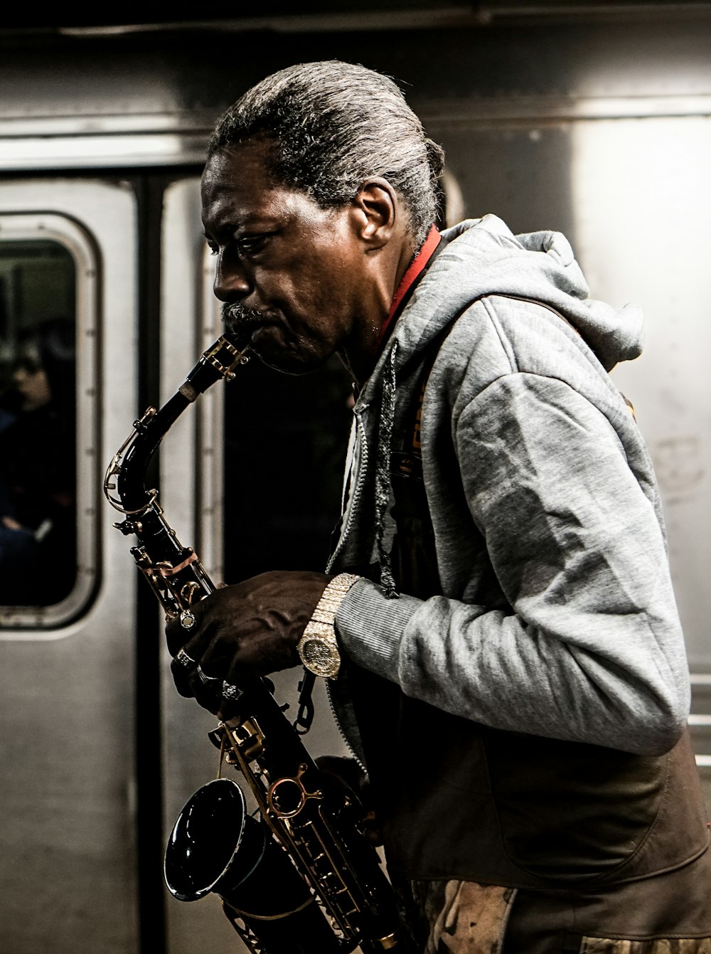 man playing wind instrument