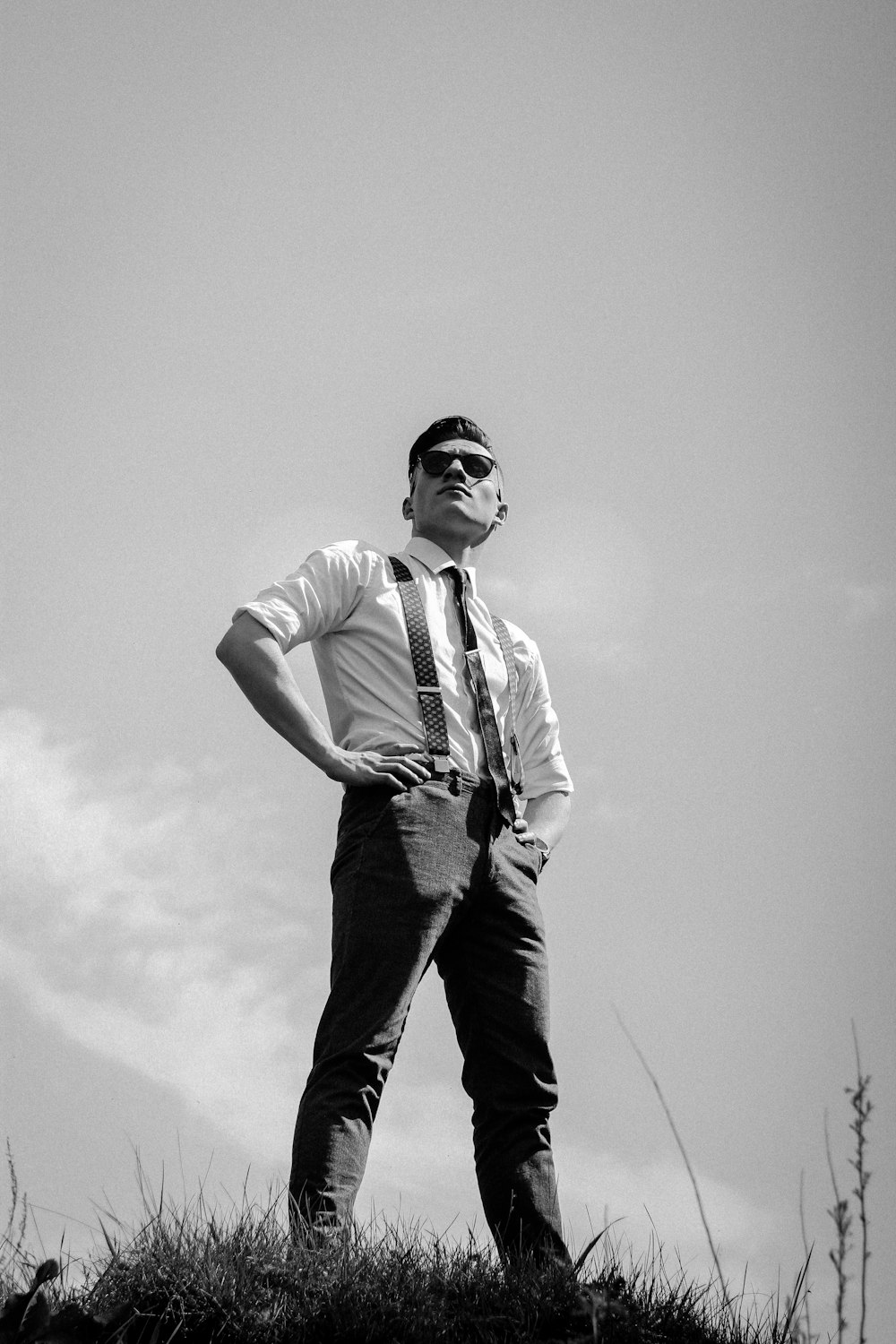 grayscale photography of standing man