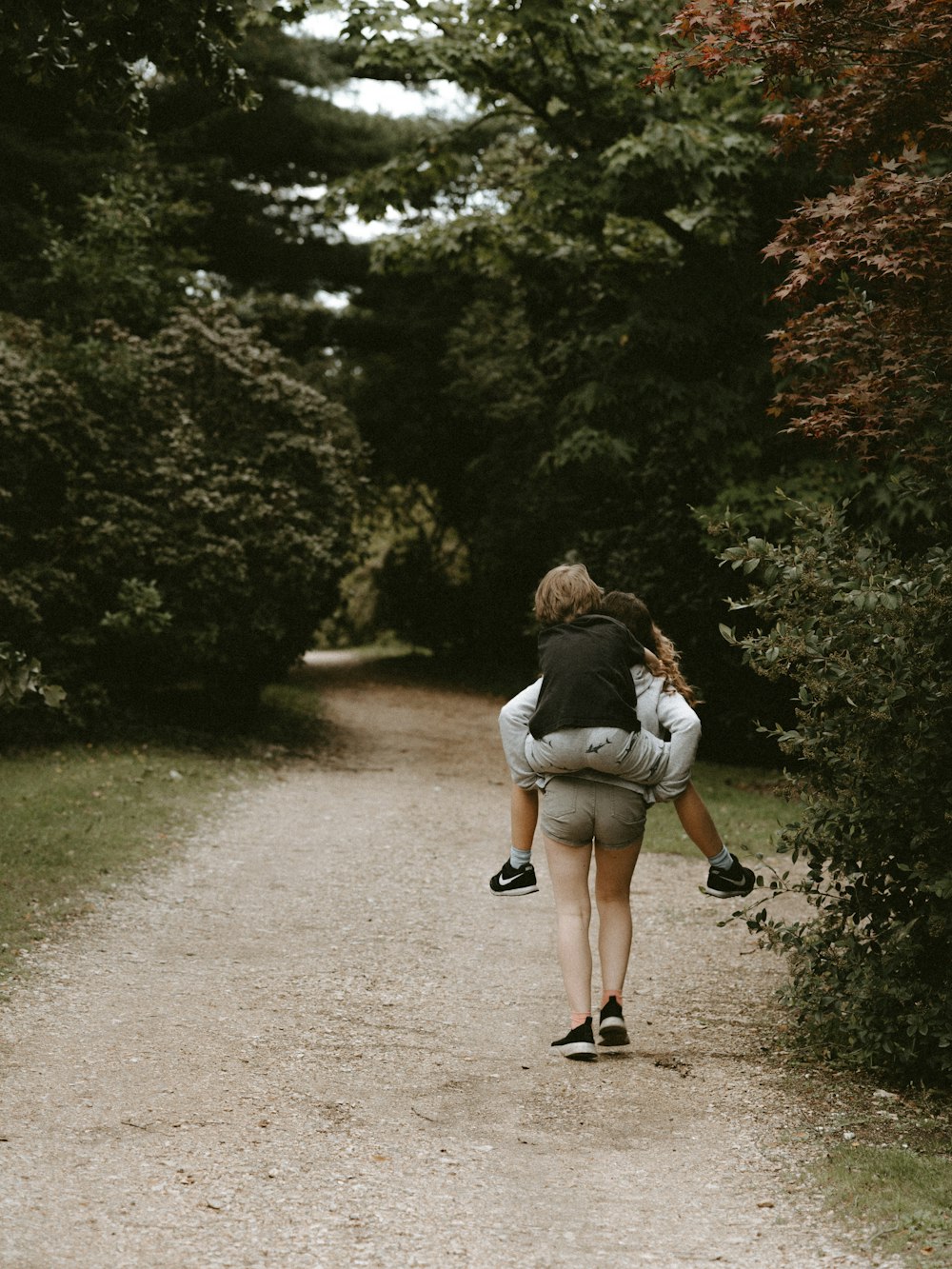 woman carries anotherwoman