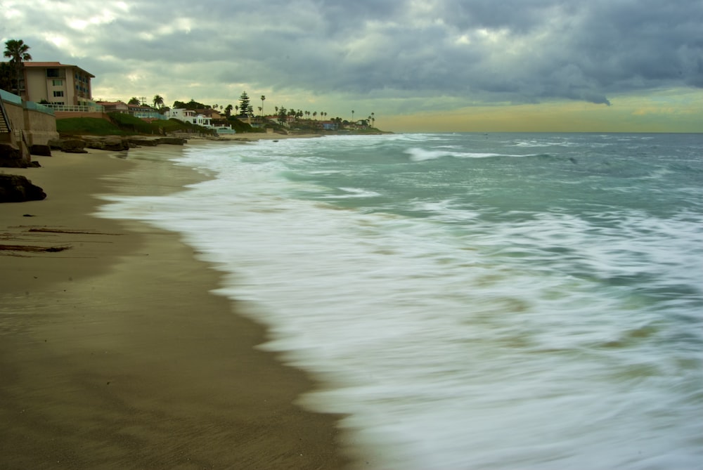 ocean under cloudy sky during daytime