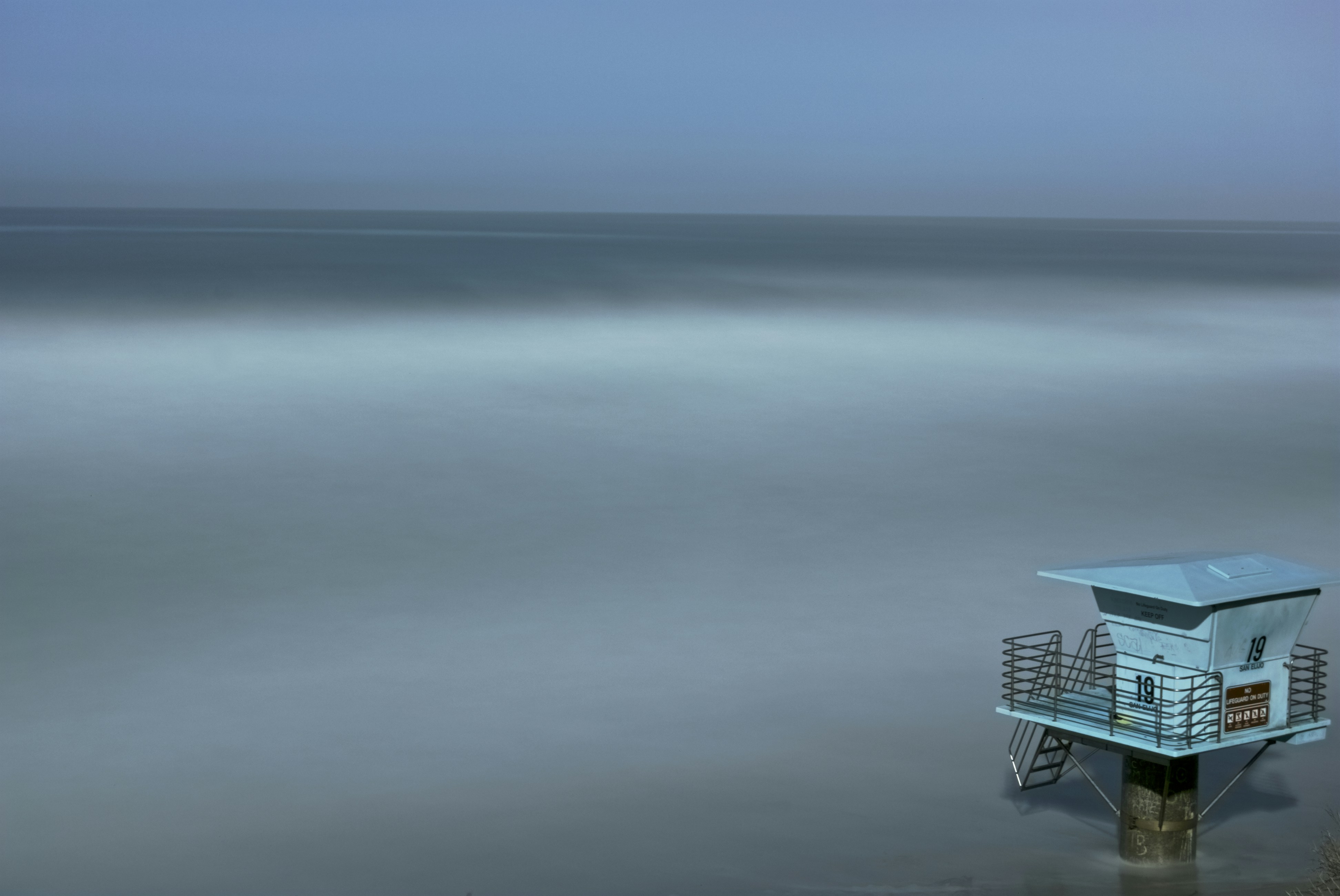 white house on body of water during daytime
