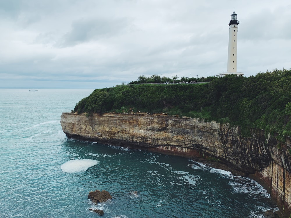 lighthouse near cliff