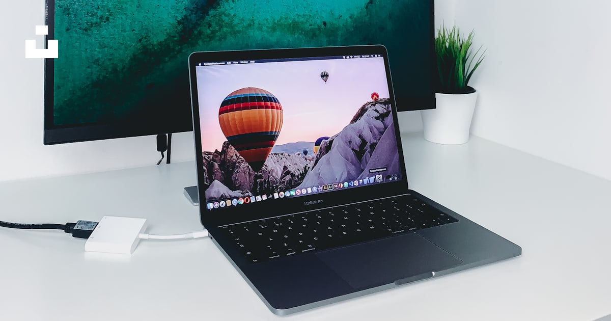 Black laptop computer in front of TV photo – Free Cashmore house Image ...