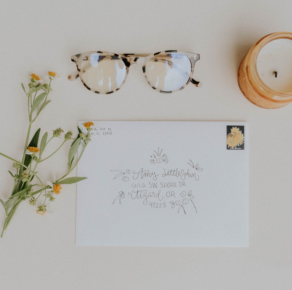 white and black framed eyeglasses