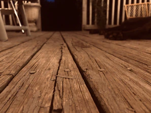 Close-up of room’s wooden flooring and a soft rug adding warmth to the space.