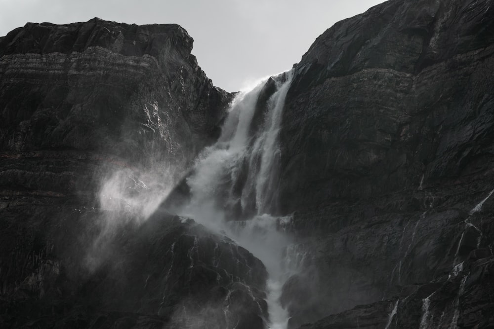 grayscale photography of waterfalls