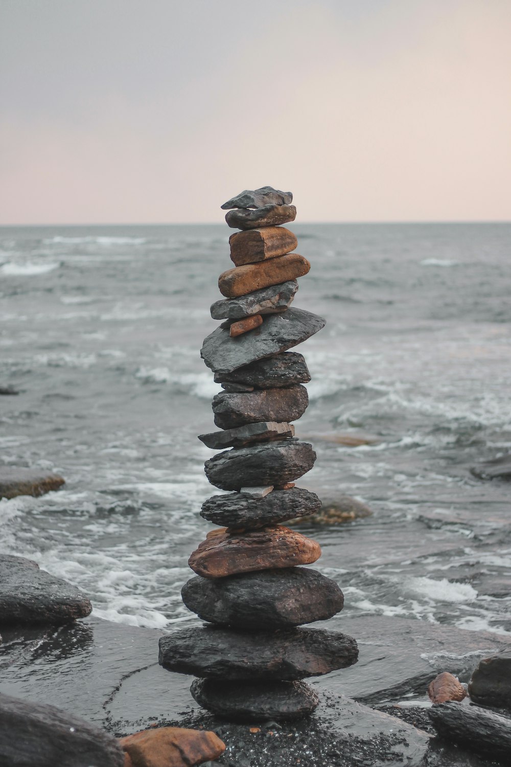 rock balancing near beach