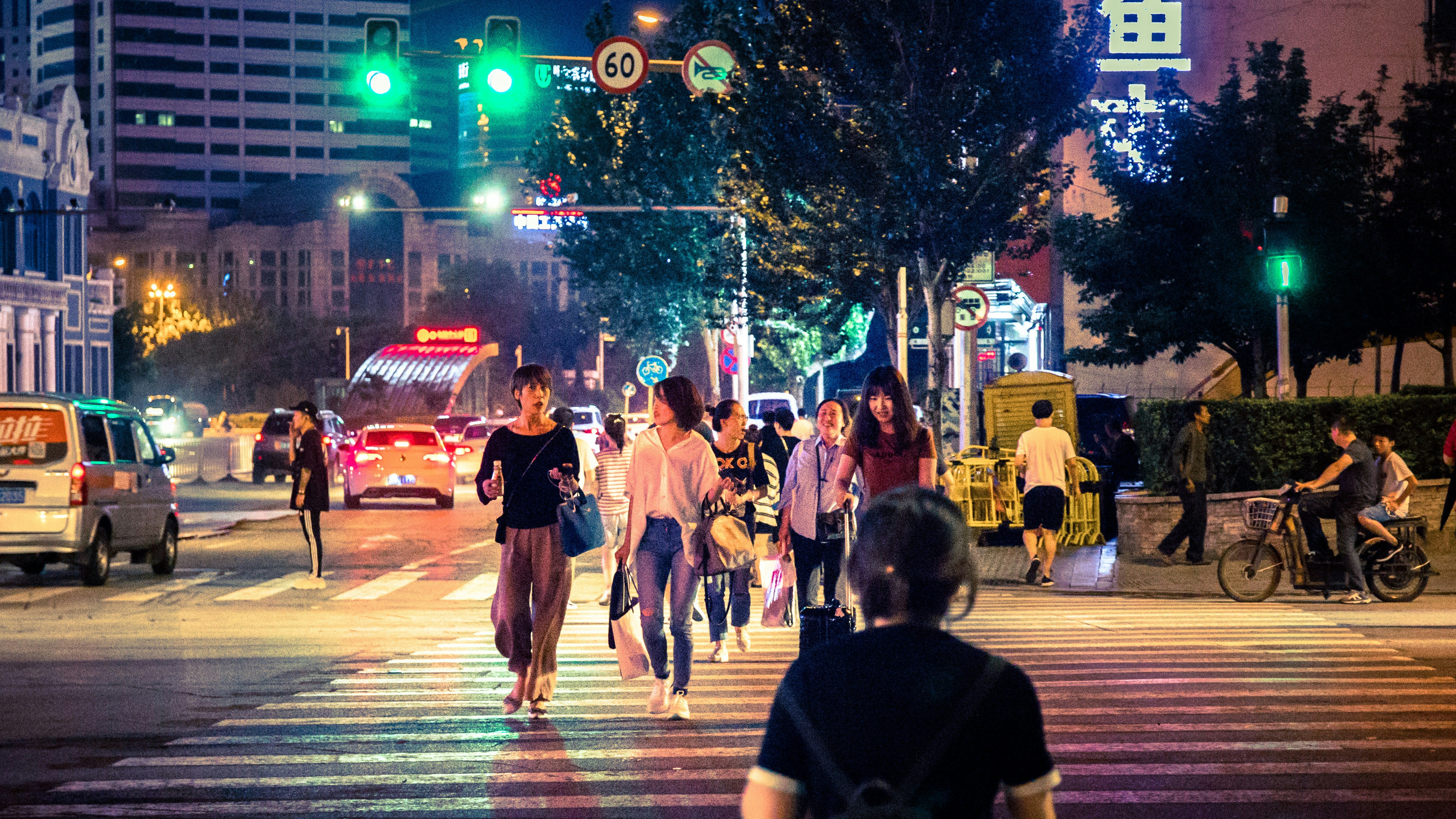 people walking on pedestrian lane