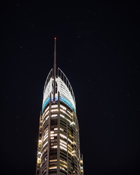 gray building under clear night sky in Q1 Skypoint Australia