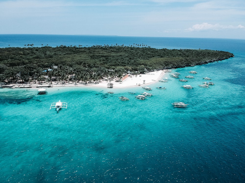 boats on water near island