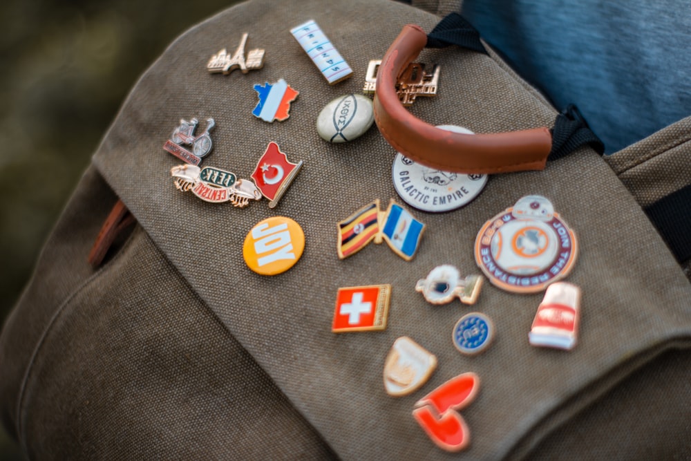 assorted-colored lapel pin lot