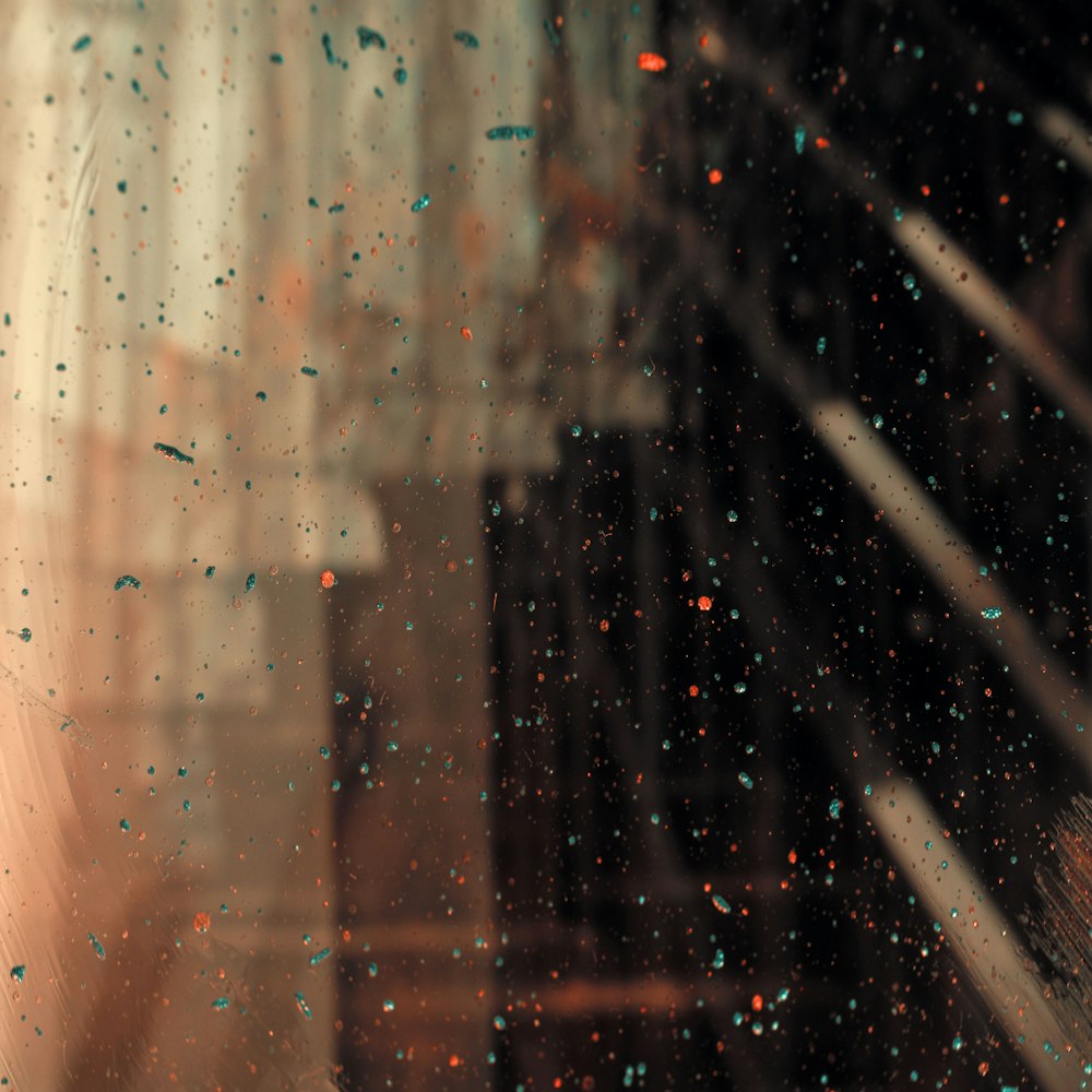 a window with rain drops on the glass