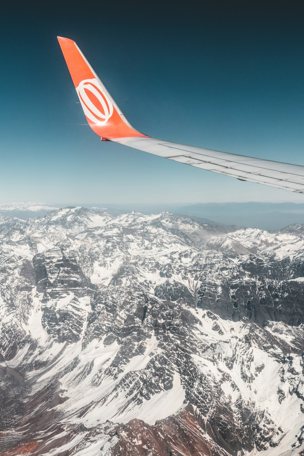 white and orange airplane wing