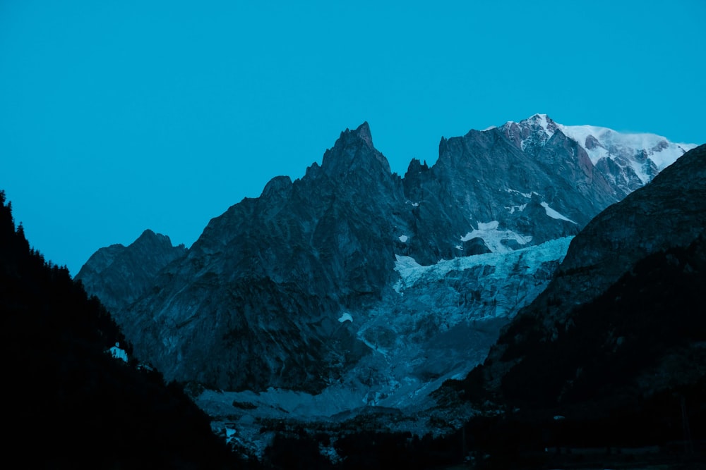 mountain covered with snow during daytime