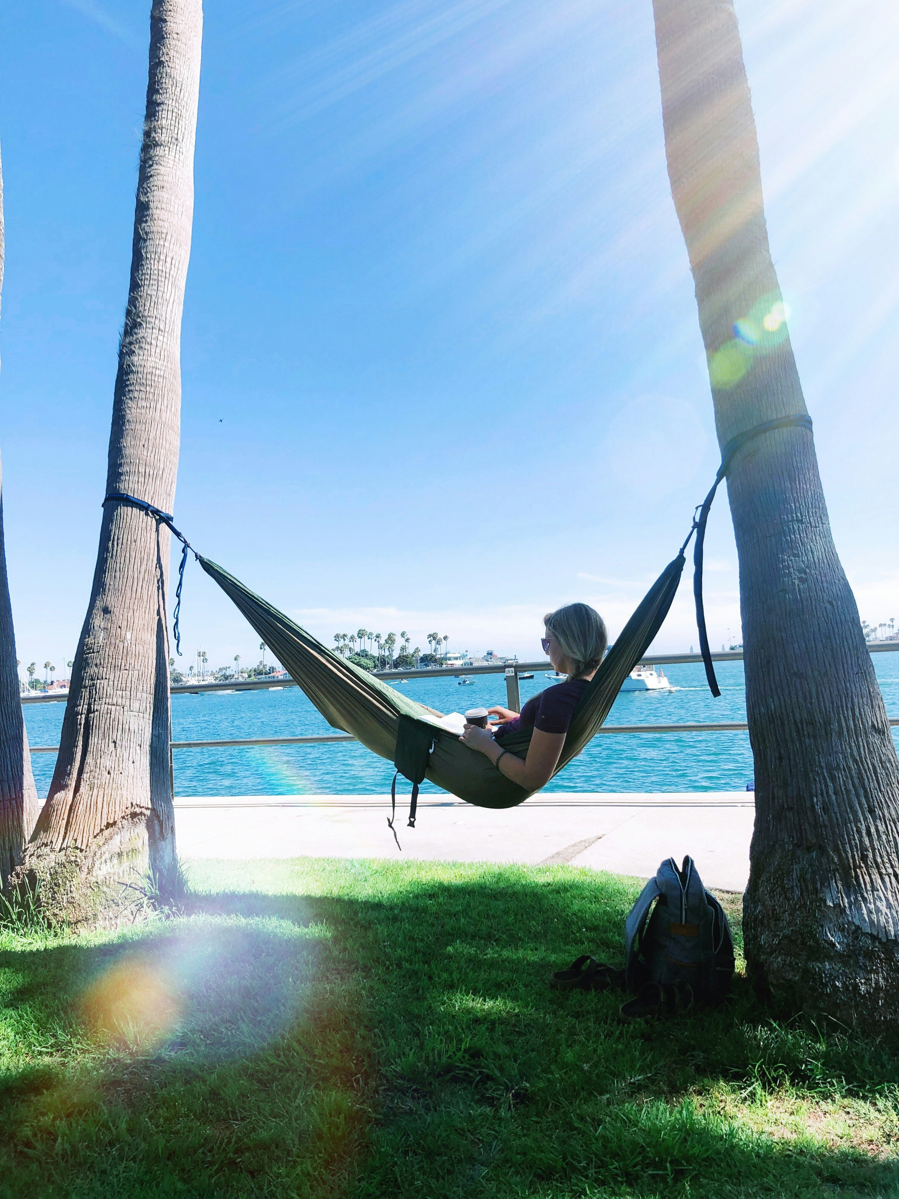 woman lying on hammock