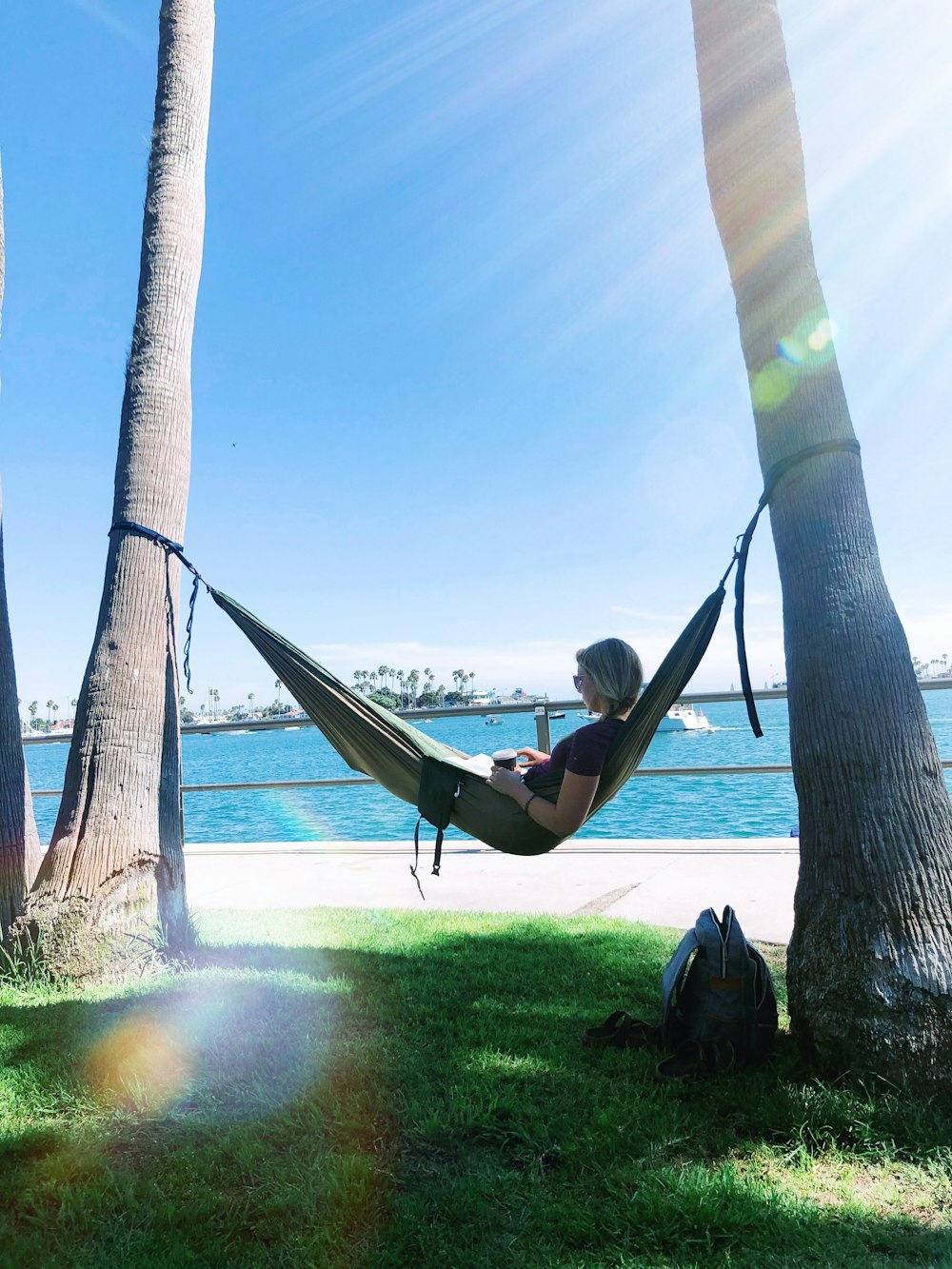 woman lying on hammock