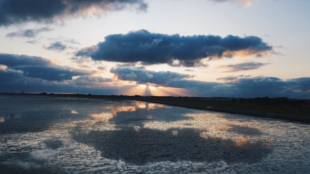 calm body of water during daytime