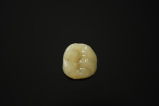 A high-quality dental piece displayed on a clean surface.
