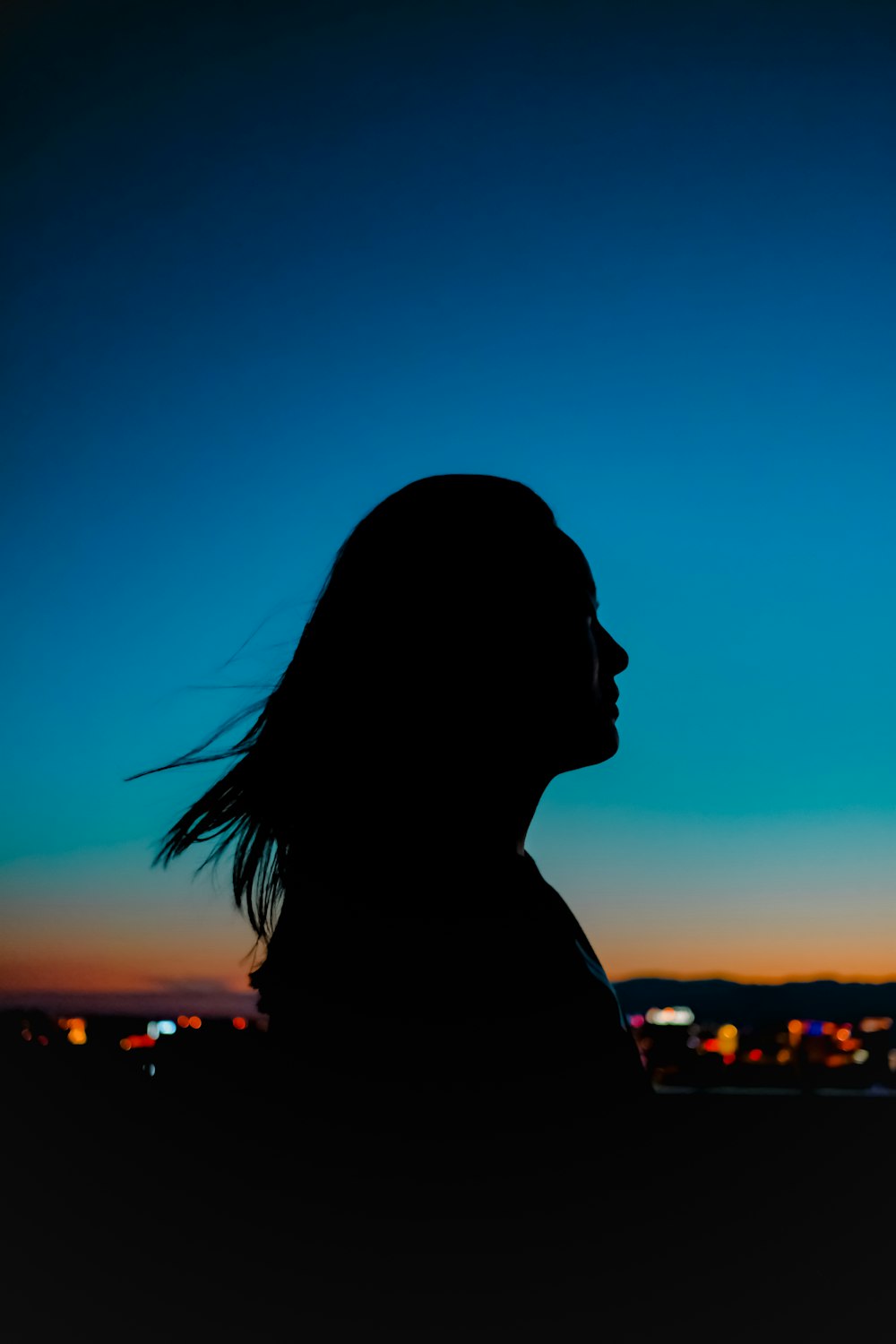 silhouette of a woman at sunset