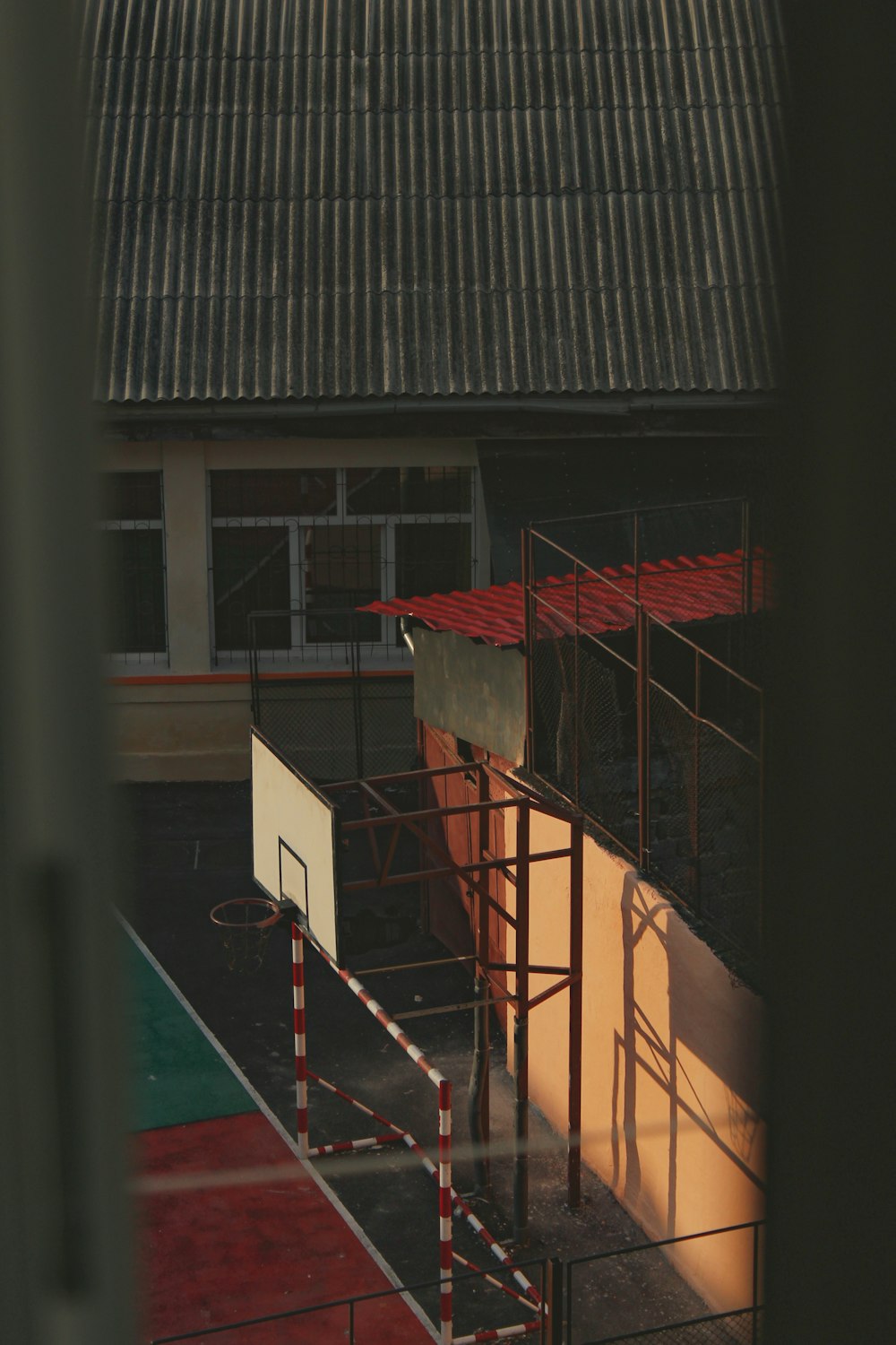 a view of a basketball court through a window