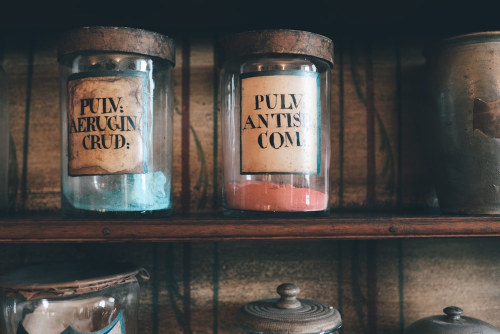 several glass jars on shelf