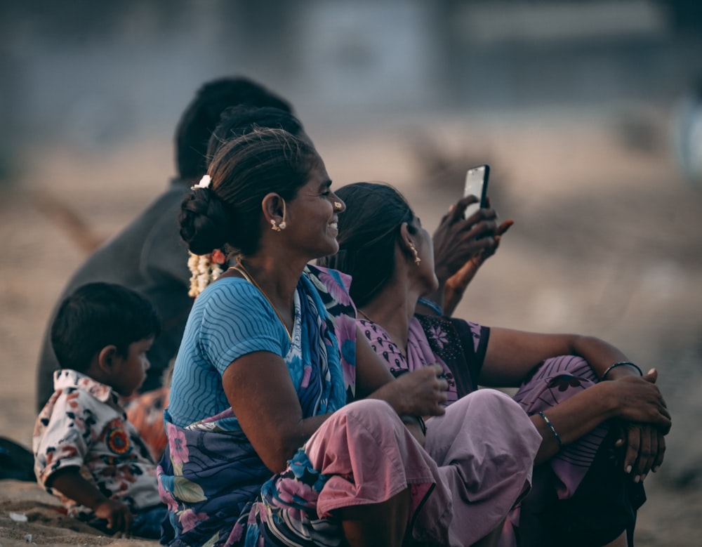 people sitting on the ground