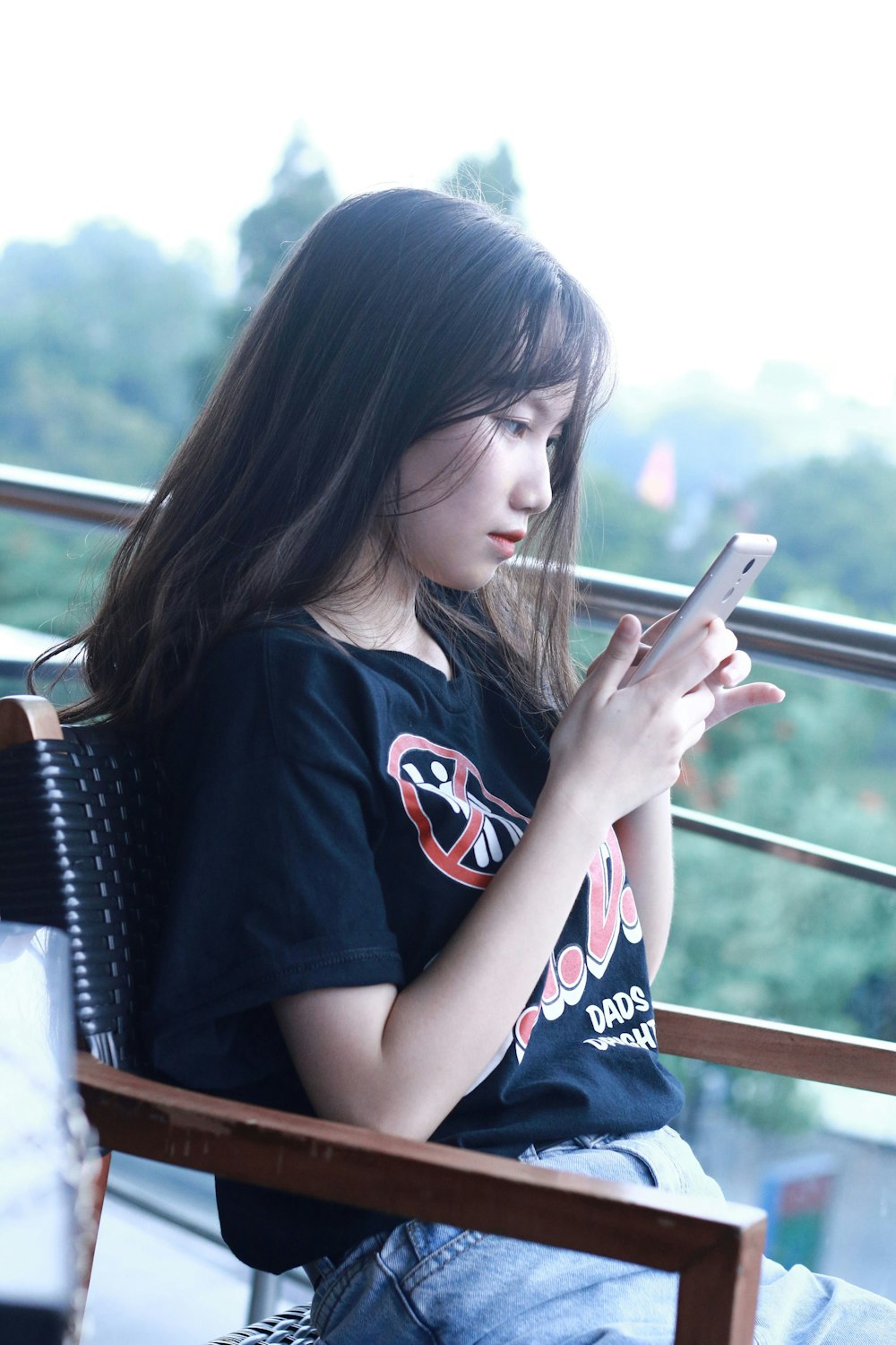 shallow focus photo of woman in black T-shirt