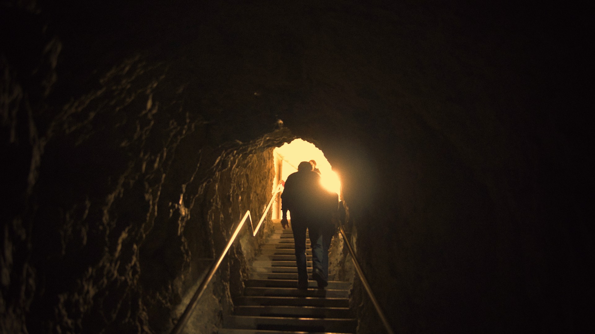 person walking up stairs
