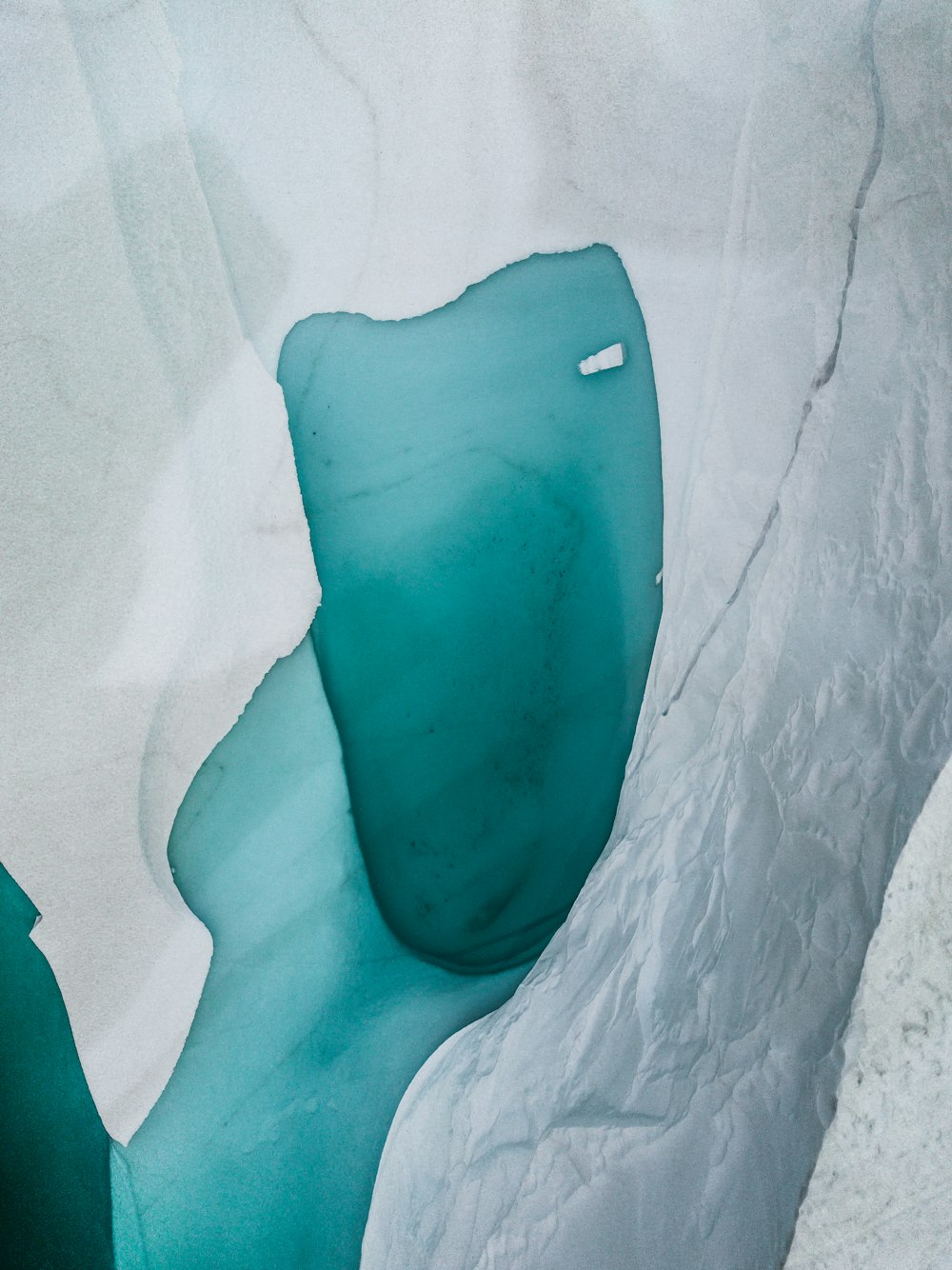 an ice cave with water inside of it