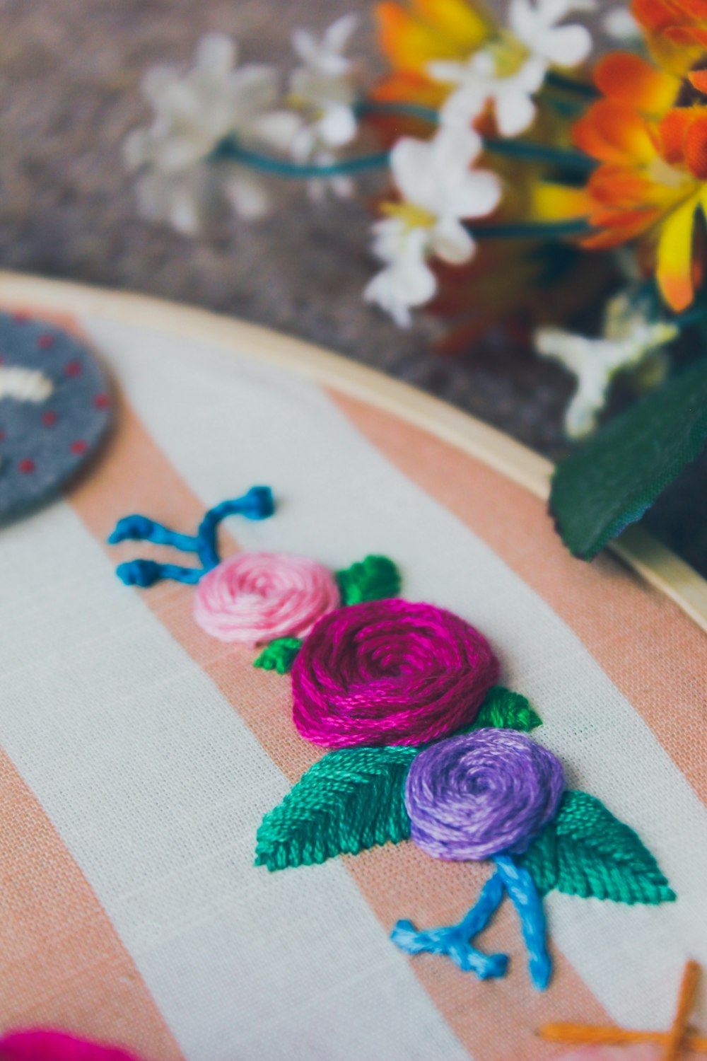 assorted-color flower embroidered decor