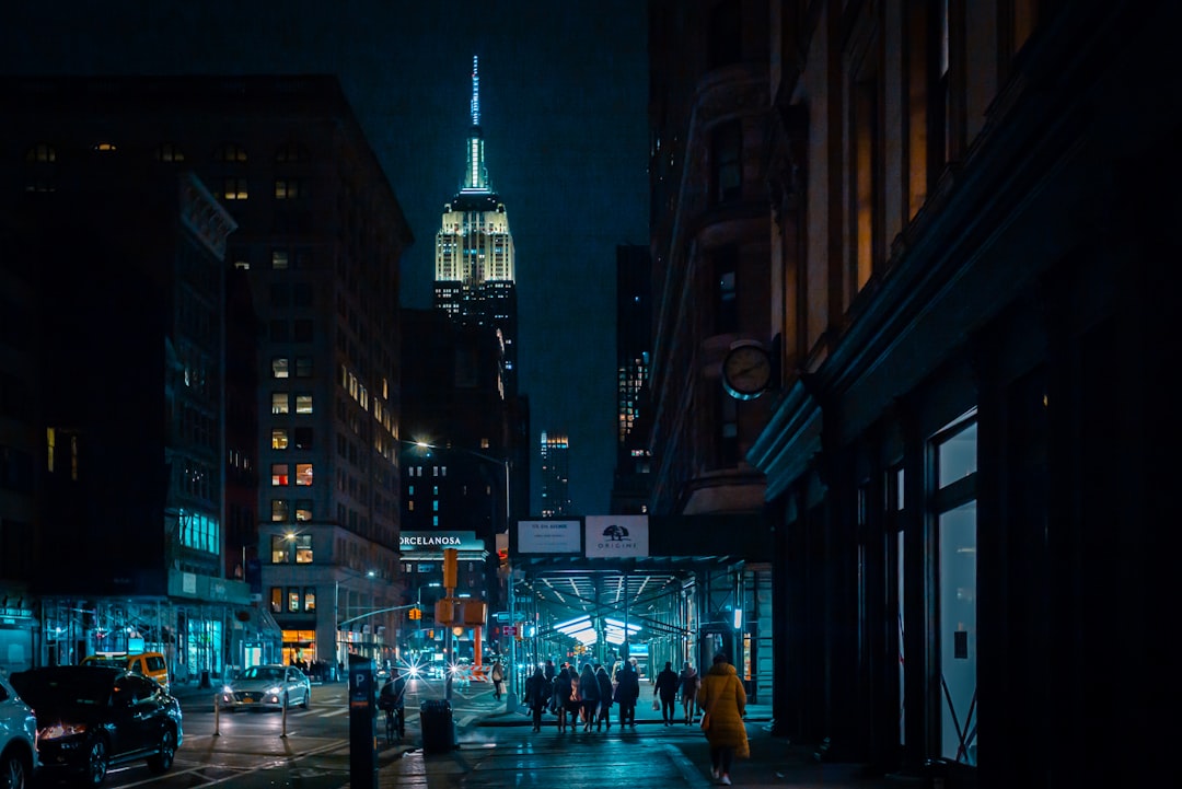 people walking on street at night