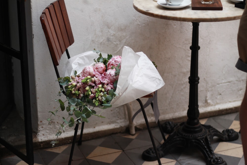 pink rose bouquet on chair