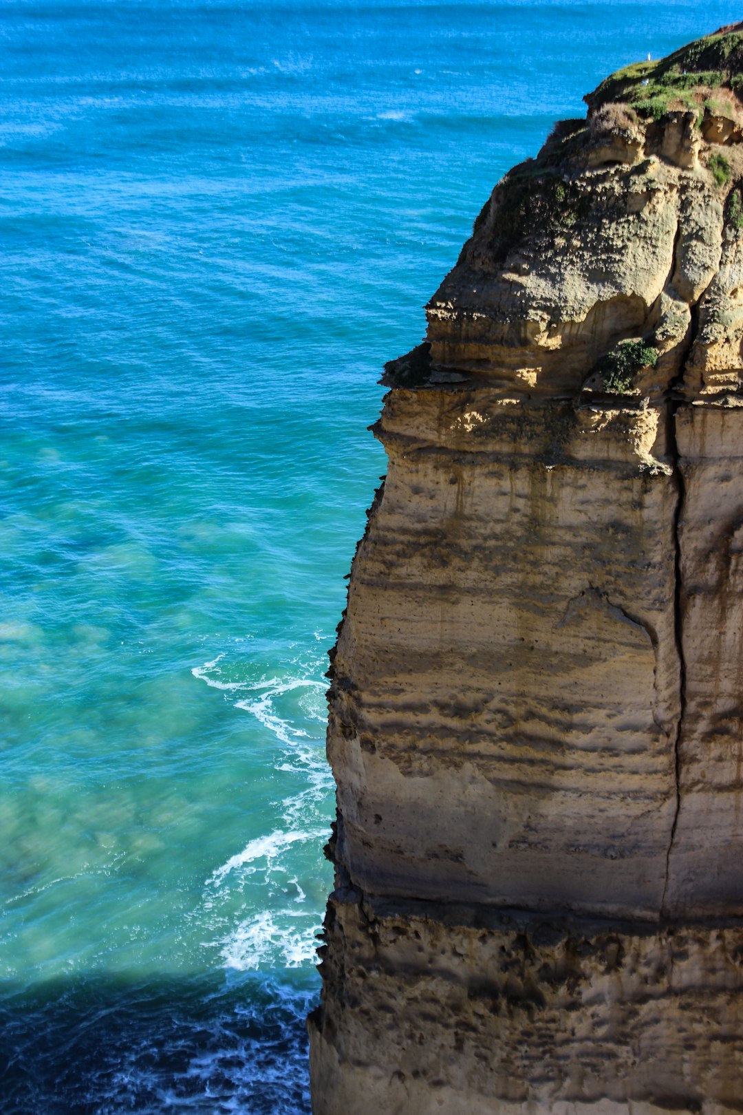 body of water and stone formation