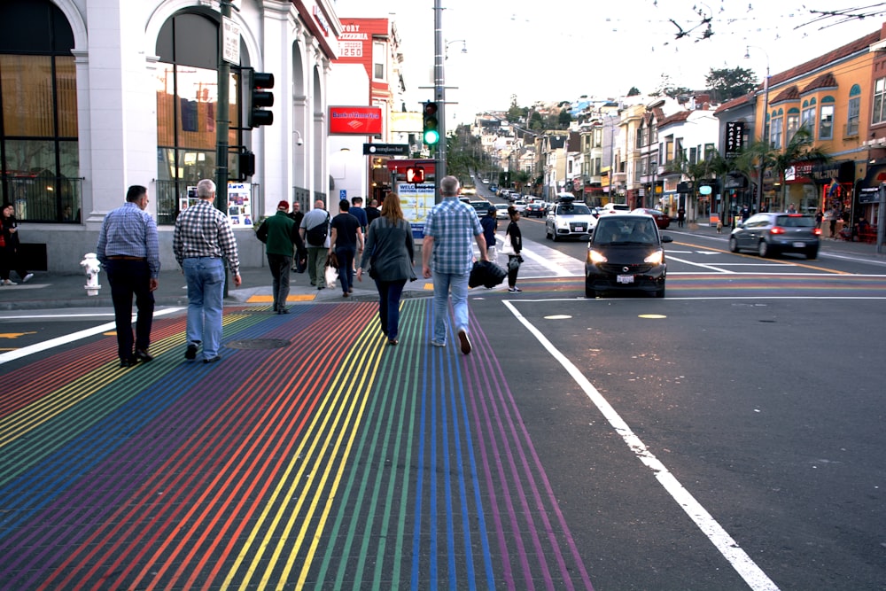 people crossing pedestrian lane