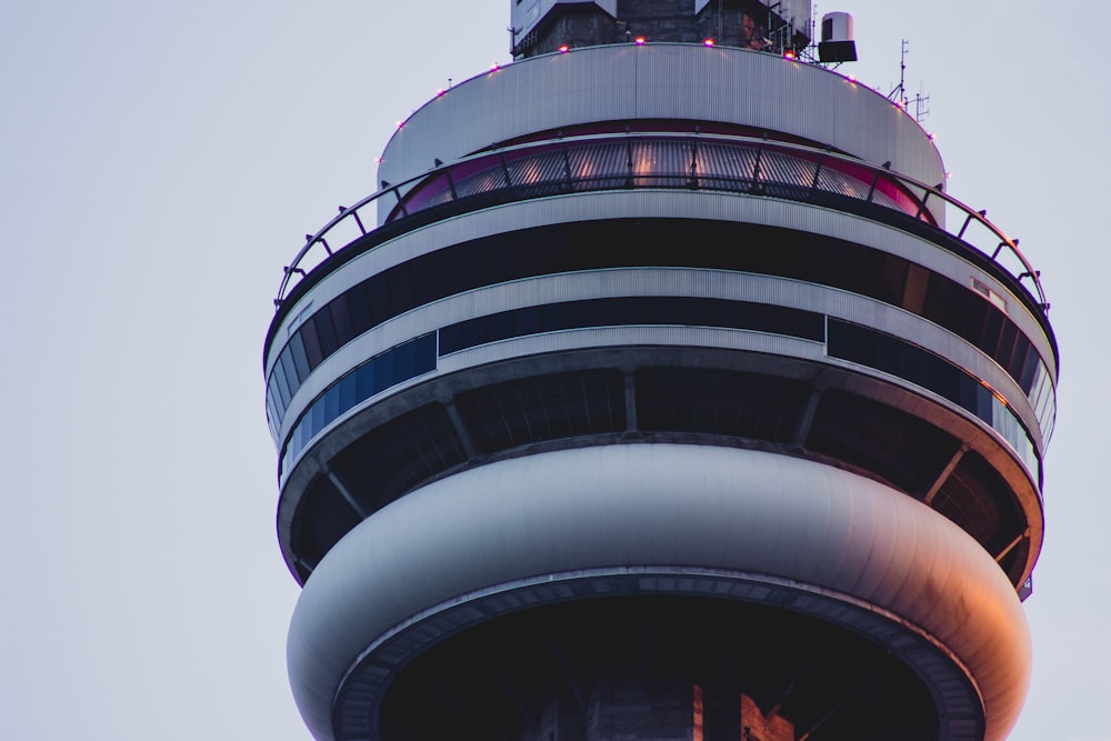 a tall tower with a clock on the top of it