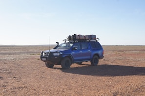 grey pickup truck with camper shell