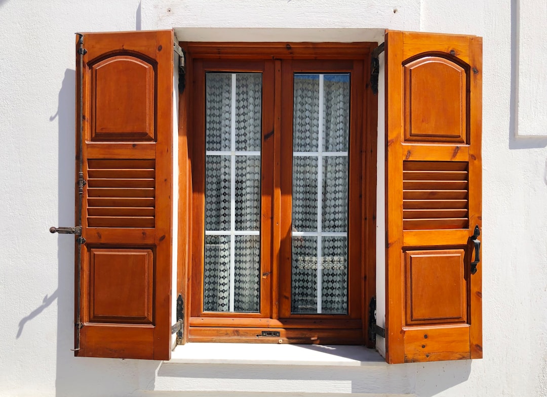 brown wooden window shutter