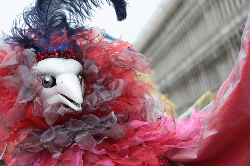 red and gray mesh bird costume