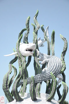 shark and crocodile statue