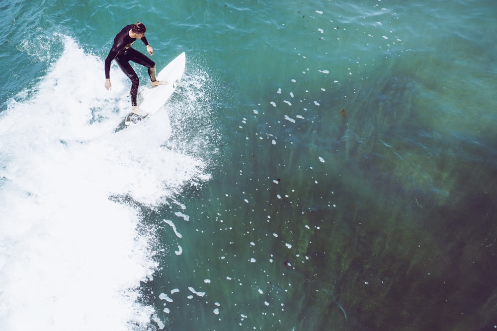 man surfboarding