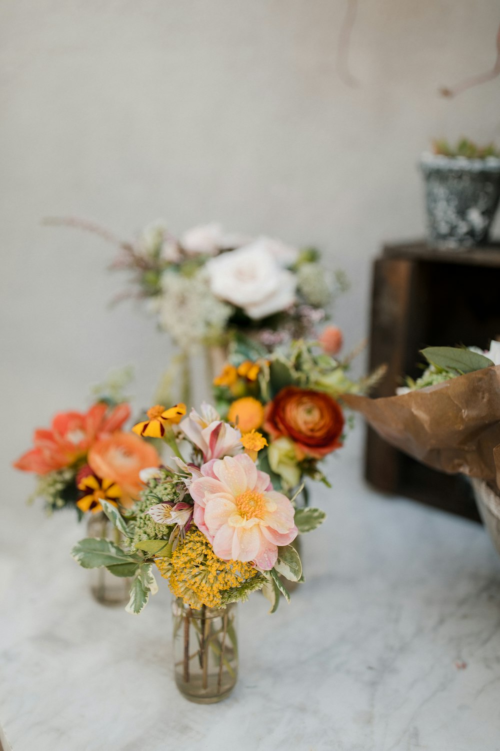 assorted flowers in glass vase