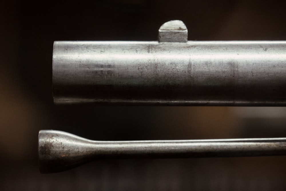 a close up of a metal object with a blurry background