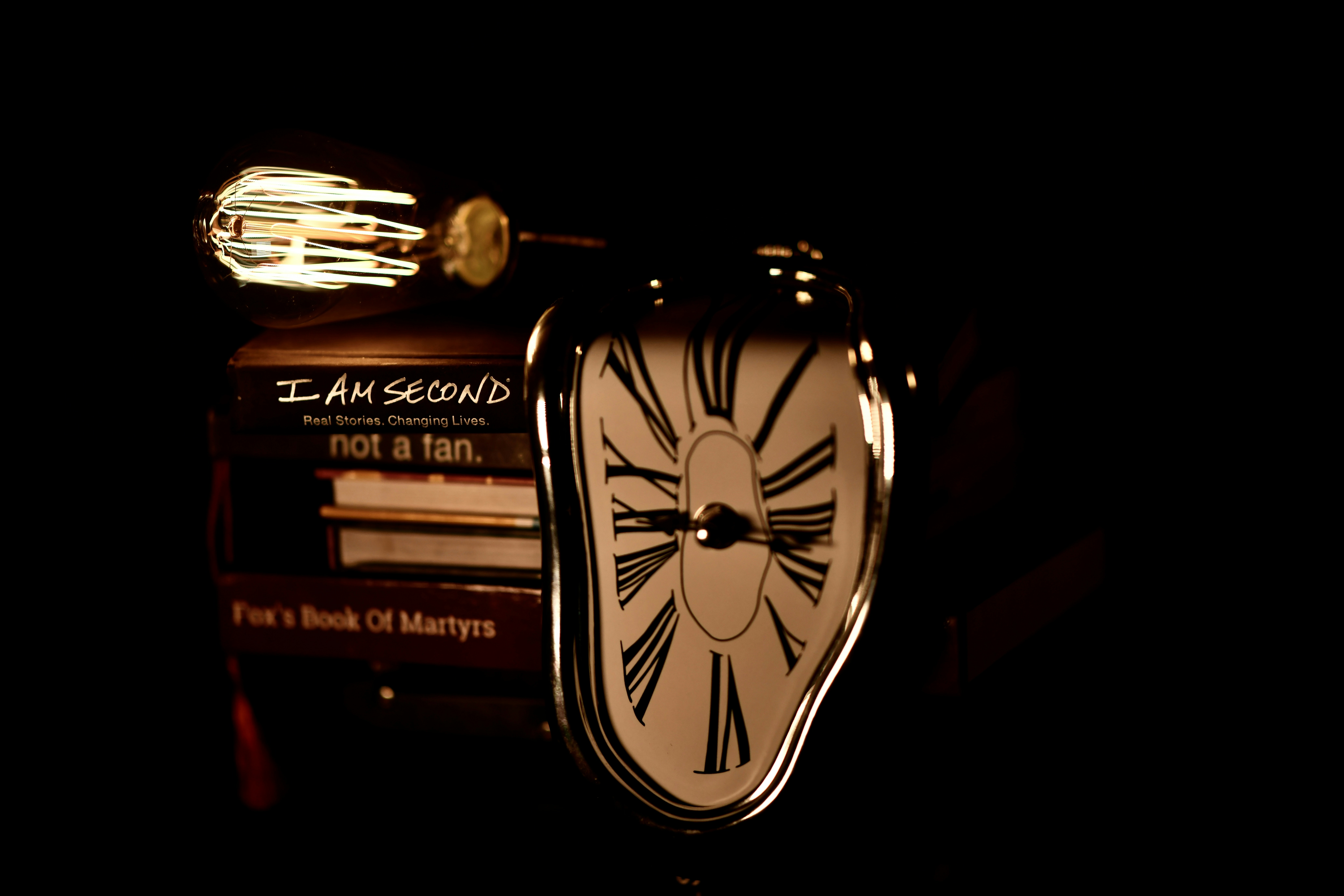 black framed Dali Uhr clock